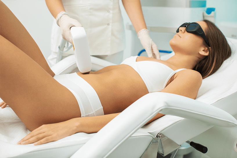 Patient receiving stomach laser hair removal