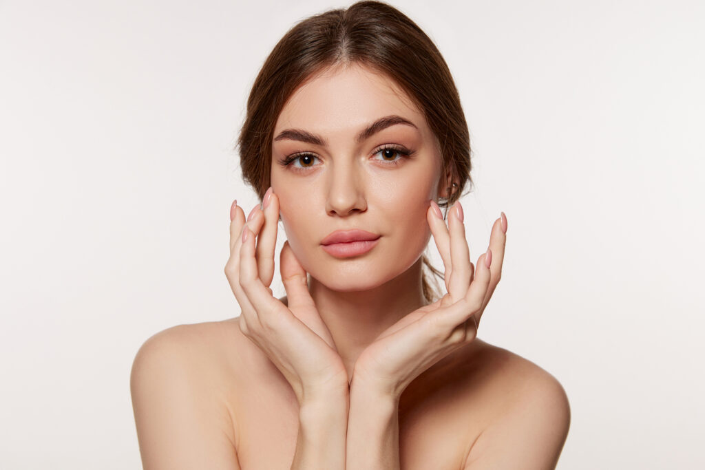 Woman with clear skin after microneedling radiofrequency